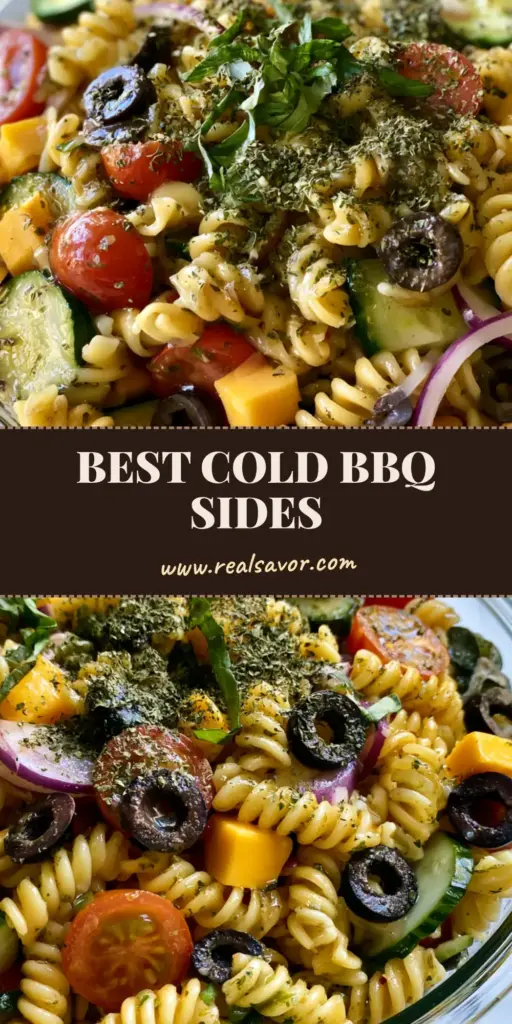 A top-down view of a vibrant rotini pasta salad with cheddar cubes and cherry tomatoes in a clear bowl. (Cold BBQ Side Dishes)