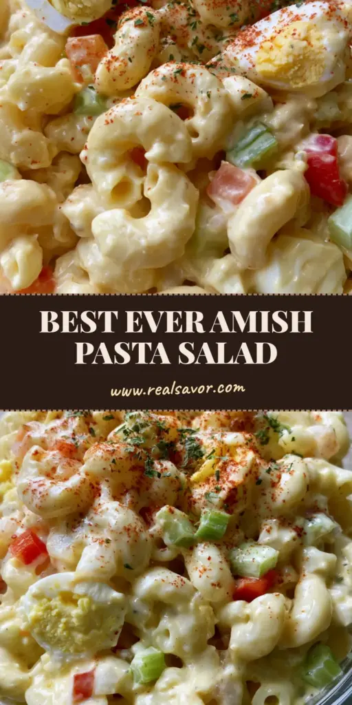 A close-up vertical shot of Amish Pasta Salad in a glass bowl with creamy yellow dressing and paprika garnish.